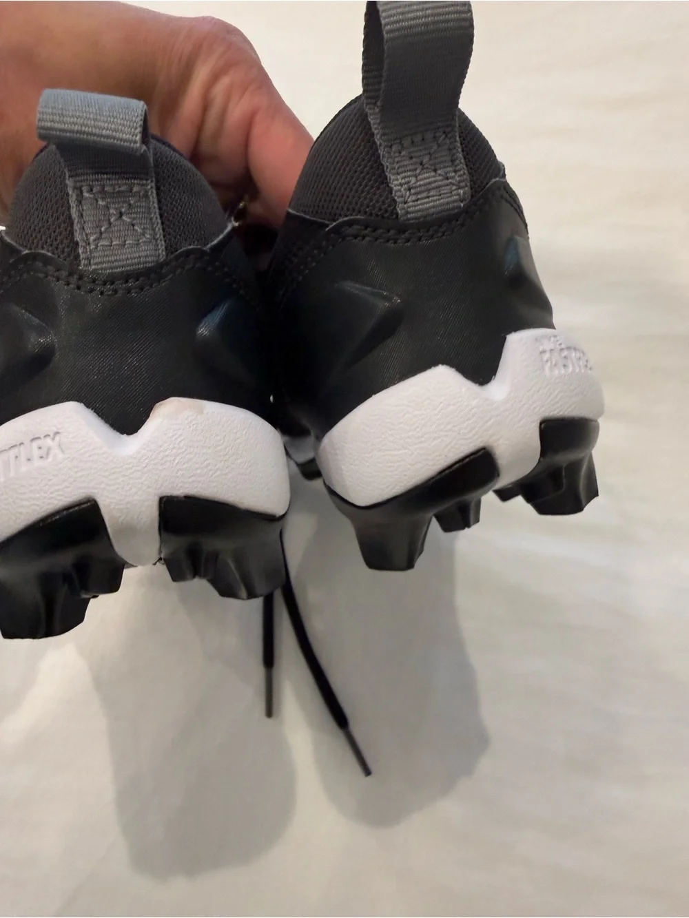 Kids Nike Black Athletic Cleats with White Accents size 1 like new